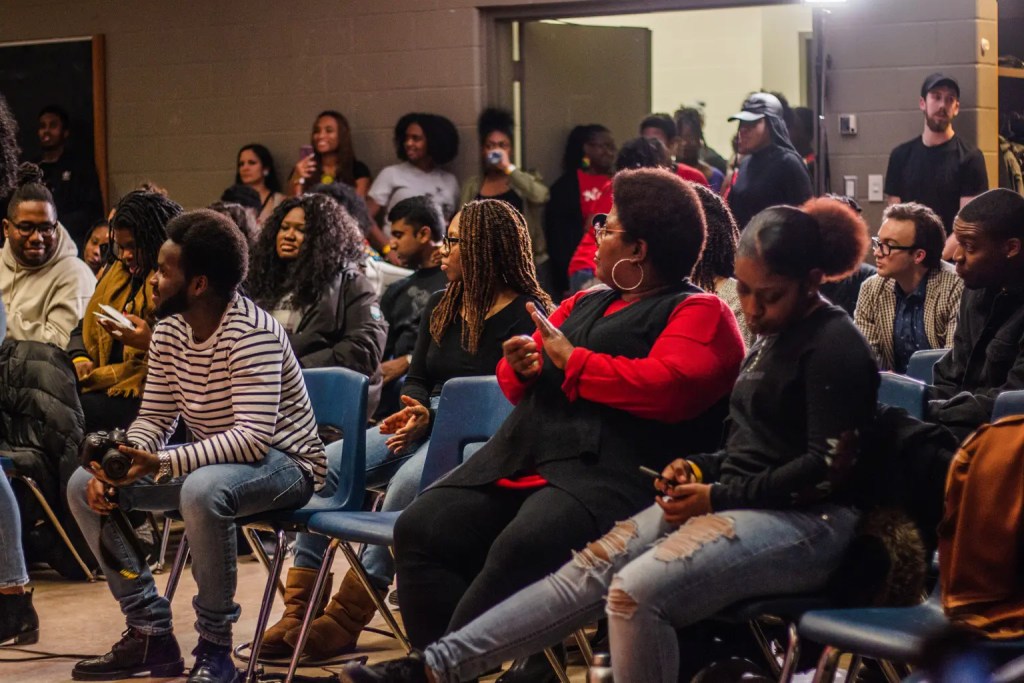 Guests of the RISE event in their seats looking around the room